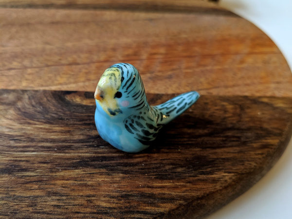 blue parakeet ceramic figure