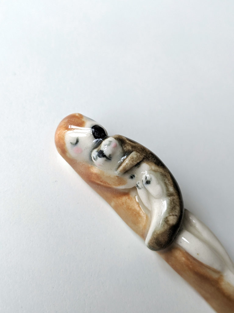 maman loutre et bébé figurine céramique