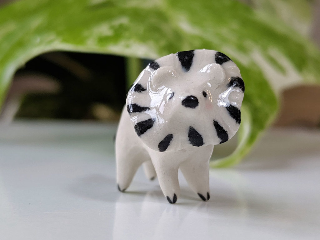 mini lion porcelaine