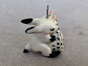 pendentif lapin oppossum porcelaine