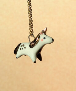Golden ceramic unicorn pendant