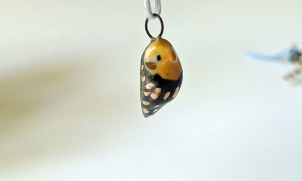 cockatiel ceramics gold pendant