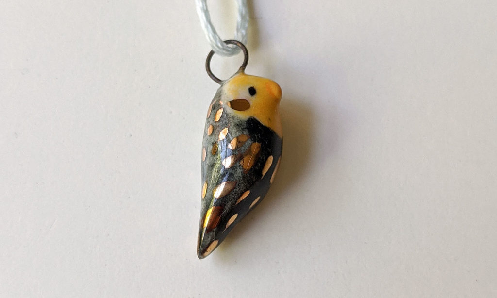 cockatiel ceramics gold pendant