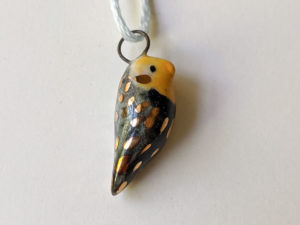 cockatiel ceramics gold pendant