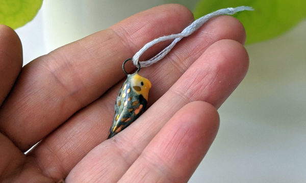 cockatiel ceramics gold pendant