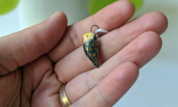 cockatiel ceramics gold pendant