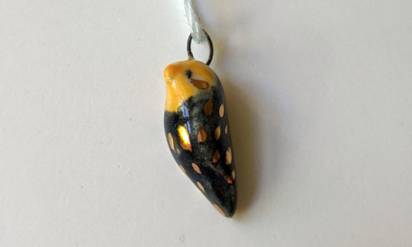 pendentif calopsite porcelaine et or