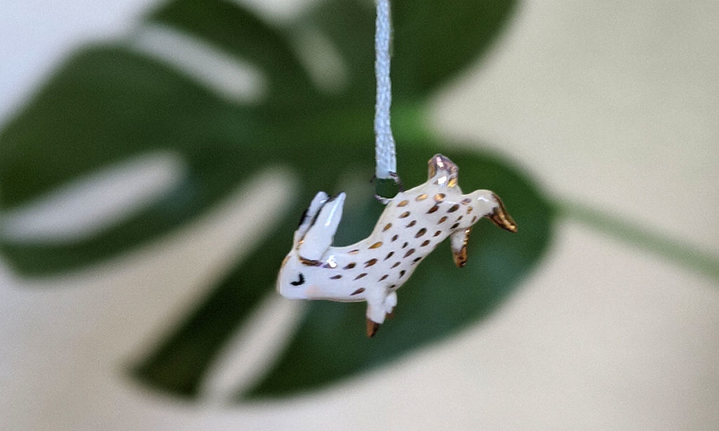 gold and clay bunny pendent