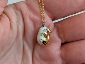 porcelain pendant platypus gold