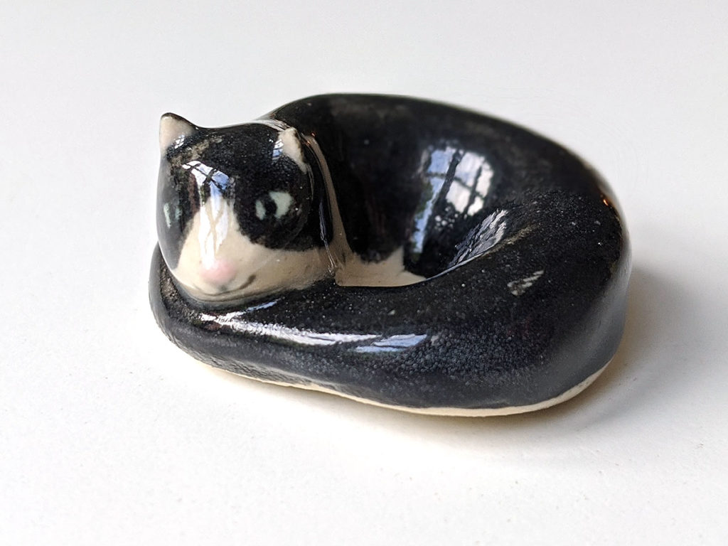 chat rond porcelaine