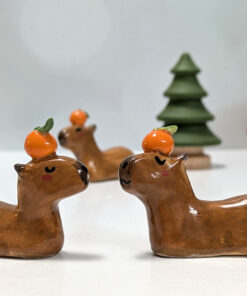 ceramic figurine capybara orange holder