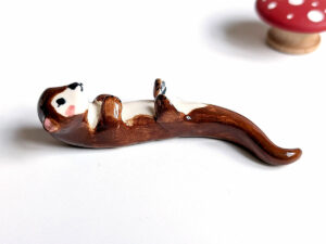 otter porcelain figurine