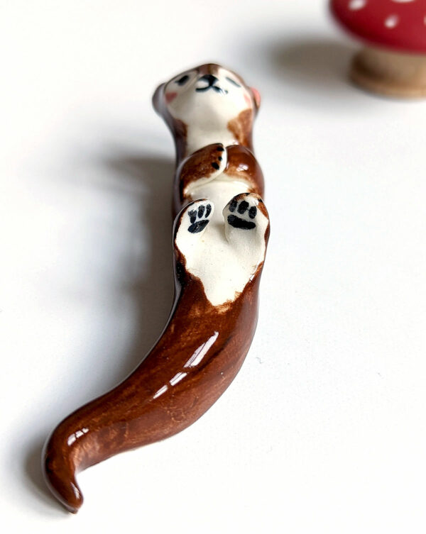 otter porcelain figurine