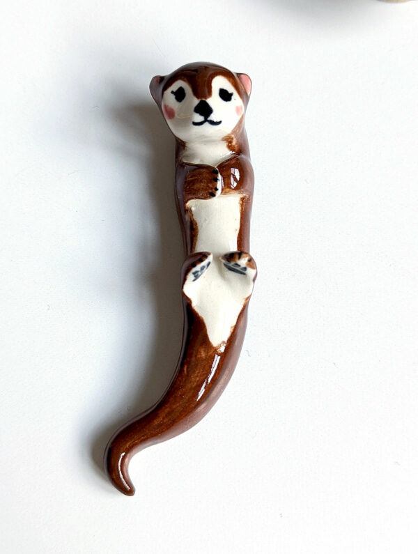 otter porcelain figurine