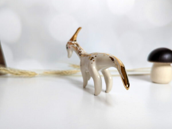 figurine porcelaine parasaurolophus