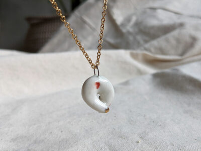 Winter stoat ceramics and gold pendant - Image 6