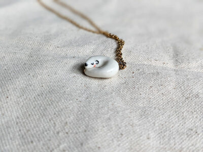 Winter stoat ceramics and gold pendant - Image 2