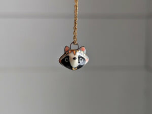 cute raccoon portrait pendant