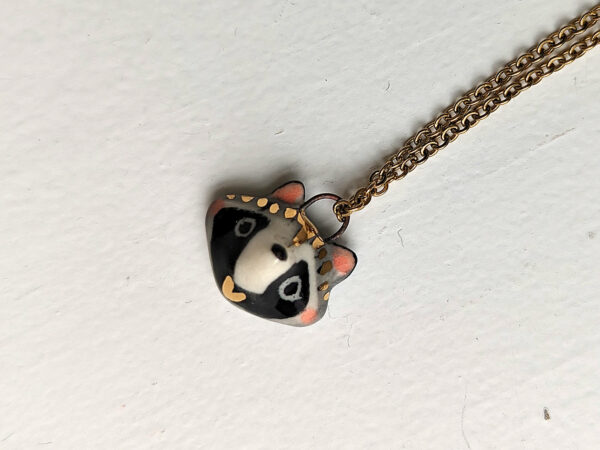 cute raccoon portrait pendant