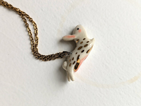 cute bunny porcelain pendant in gold and white