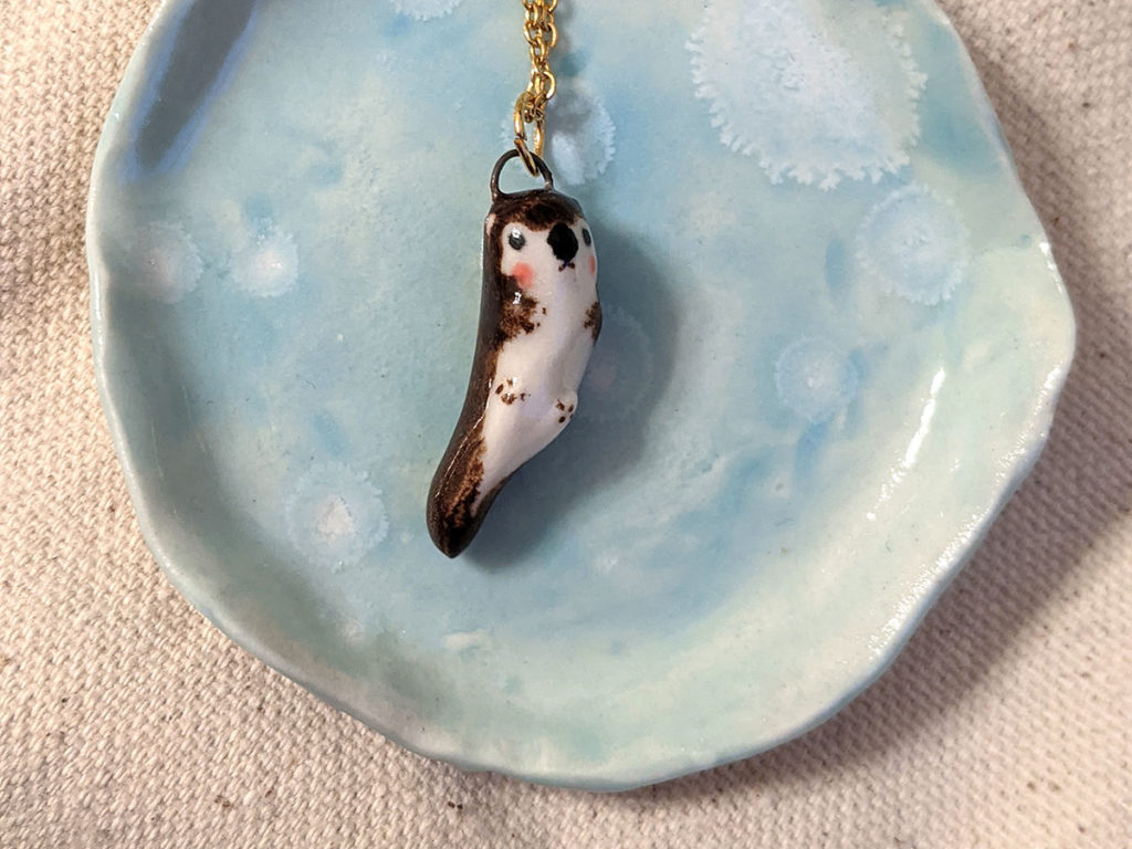 pendentif loutre