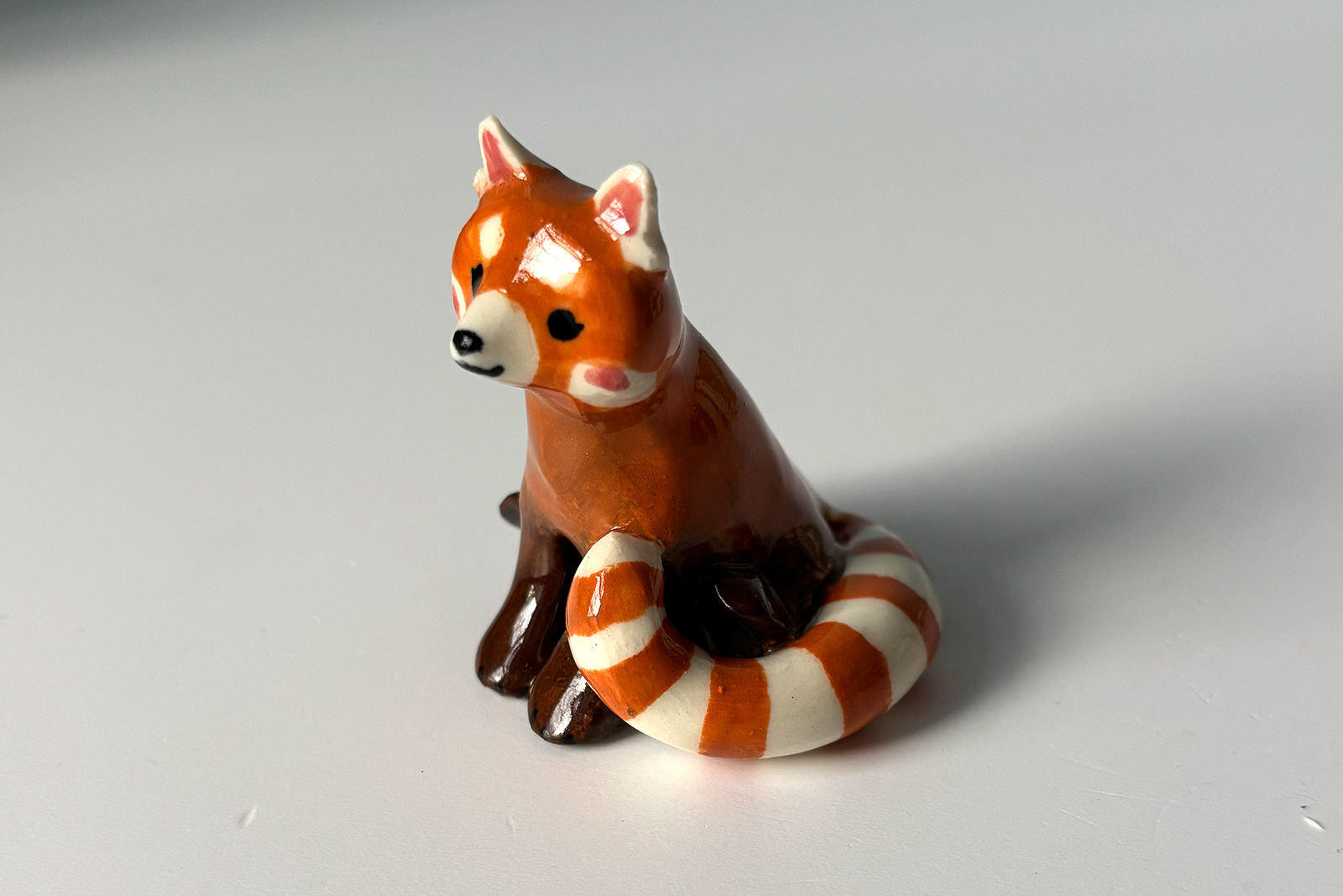 red panda figurine porcelain