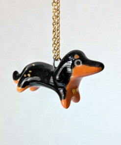 adorable dachshund porcelain pendant with gold, handmade