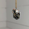 porcelain raccoon pendant