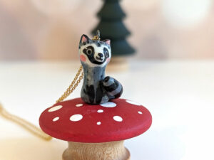 porcelain raccoon pendant