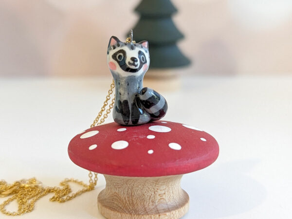 porcelain raccoon pendant