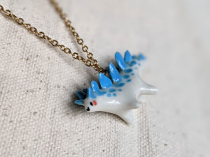 stegosaurus pendant blue