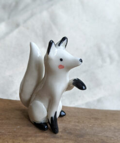 sitting arctic fox