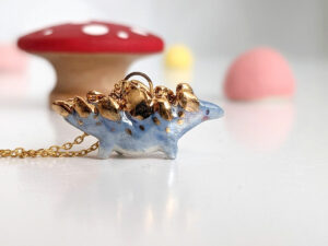 stegosaurus pendant blue