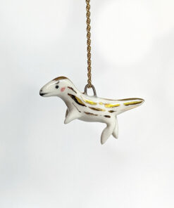 porcelain raptor pendant