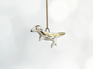 porcelain raptor pendant