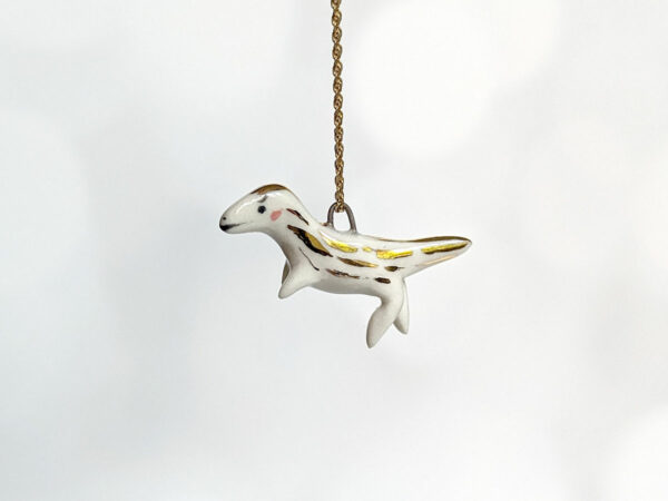 porcelain raptor pendant