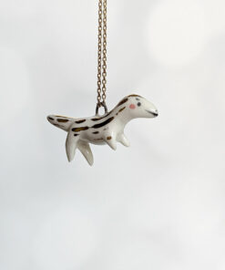 porcelain raptor pendant
