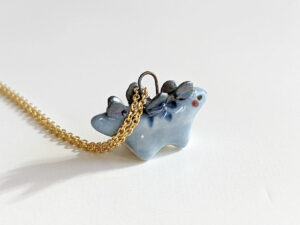 blue stegosaurus pendant cute porcelain jewelry by kness