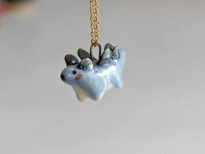 blue stegosaurus pendant cute porcelain jewelry by kness