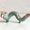 cute east dragon porcelain figurine in blue pink and gold