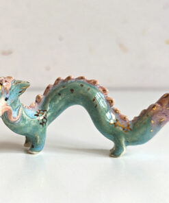 cute east dragon porcelain figurine in blue pink and gold