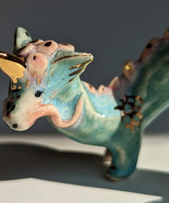 cute east dragon porcelain figurine in blue pink and gold