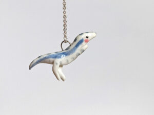 velociraptor pendant blue porcelain
