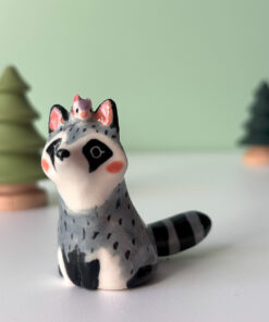 porcelain raccoon figurine cute