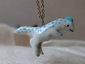 dilophosaurus pendant