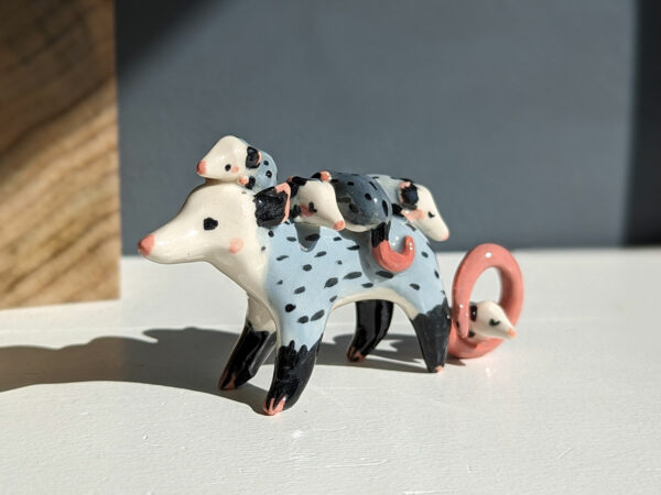 opossum family figurine