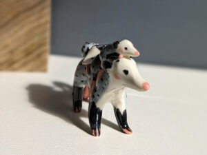 opossum family figurine