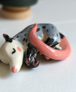 porcelain figurine handmade sleeping opossum kness