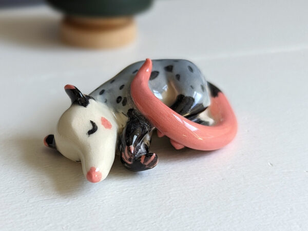 porcelain figurine handmade sleeping opossum kness