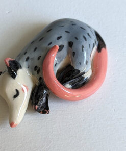 porcelain figurine handmade sleeping opossum kness